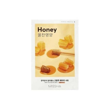 Un paquet de Missha Airy Fit Masque en Tissu Rafraîchit et Lisse la Peau 19 ml, avec des images de nid d'abeille et de louche en bois sur fond blanc, comporte des textes en anglais et en coréen sur son emballage. Dakar