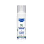 Une bouteille de shampoing mousse Mustela pour nouveau-nés, étiquetée pour les croûtes de lait, avec un distributeur à pompe blanc et un design bleu, vert et blanc. Le flacon est de 150 ml (5.07 US fl oz). Dakar