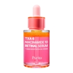 Un flacon en verre rose de Purito TXA 6 Niacinamide 10 Retinal Serum avec un liquide orange à l'intérieur et un bouchon compte-gouttes rose. L'étiquette le décrit comme un sérum facial tonifiant et stimulant. Dakar