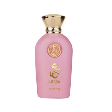 Un flacon de parfum rose avec un bouchon doré, présentant un motif de rose et une calligraphie arabe dorée. Les mots "ABEER" et "RIFFS" sont également imprimés en or sur le devant du flacon. Dakar