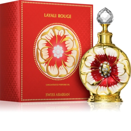 Un flacon décoratif de 15ml de Swiss Arabian Layali Rouge Huile Parfumée pour Femme se trouve à côté de sa boîte florale rouge et or assortie, tous deux ornés de motifs floraux décoratifs et d'élégantes touches d'or. Dakar