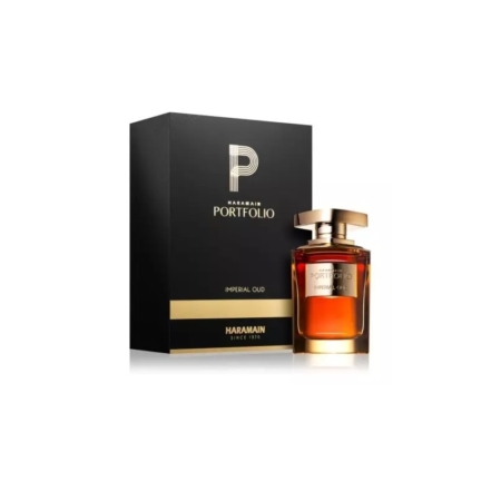 Un flacon de 75 ml d'eau de parfum mixte Al Haramain Portfolio Imperial Oud avec un bouchon en or se trouve devant son coffret noir et or, tous deux portant le nom du parfum. Le liquide ambré à l'intérieur du flacon brille. Dakar