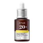 Un flacon brun d'Anua Sérum Éclaircissant Anti Imperfections Vita C au Citron Vert 20ml avec un bouchon compte-gouttes argenté, une étiquette blanche et jaune, mettant en avant la vitamine C 20 et la vitamine E pour les soins de la peau. Dakar