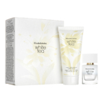 Le Coffret Cadeau White Tea d'Elizabeth Arden comprend une boîte blanche et dorée, un tube de crème pour le corps et un mini flacon de parfum, tous étiquetés "White Tea". Dakar