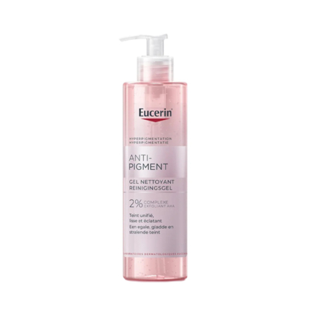 Un flacon pompe transparent d'Eucerin Anti-Pigment Cleansing Gel avec un liquide rose à l'intérieur. L'étiquette met en avant sa formule complexe à 2 % pour l'hyperpigmentation et une peau uniforme et radieuse. Dakar