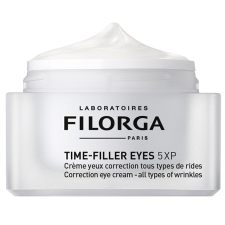 Un pot blanc de crème corrective pour les yeux TIME-FILLER EYES 5XP de Filorga avec un couvercle blanc, comportant un texte noir et gris décrivant la crème comme une crème pour tous les types de rides. Le pot est ouvert, laissant apparaître la crème à l'intérieur. Dakar