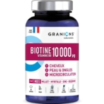 Un flacon bleu et violet de Granions Biotine 10 000 µg de suppléments de vitamine B8, étiquetés pour les cheveux, la peau et les ongles, et la microcirculation. Le flacon indique qu'il est végétalien, sans gluten, sans lactose et qu'il contient 60 comprimés. Dakar