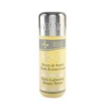 Un flacon de HT26 Paris Multi-Lightening Beauty Serum avec un bouchon argenté et une étiquette jaune, avec un texte en français et en anglais décrivant le produit comme un soin éclaircissant. Dakar