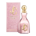 Un flacon de parfum rose avec un bouchon doré et le logo &quot;JC&quot; se trouve à côté d&#039;une boîte rose pailletée assortie portant l&#039;inscription &quot;I WANT CHOO with love&quot; de Jimmy Choo. La boîte est ornée d&#039;un texte et d&#039;une marque en or. Dakar