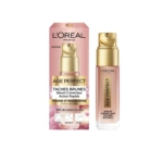 Un flacon de L'Oréal Paris Age Perfect Anti Taches Sérum Action Rapide 30 ml avec une pompe dorée se trouve à côté de son emballage rose et or, qui affiche les détails du produit en français. Dakar