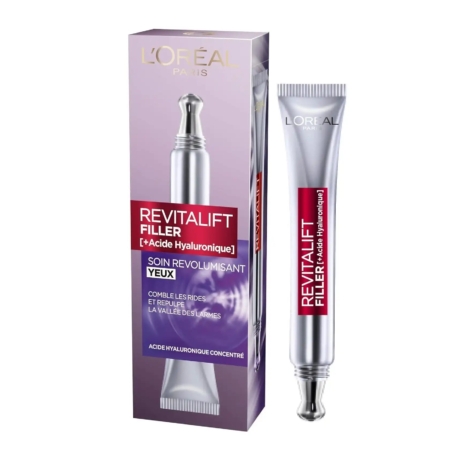 Tube de la crème pour les yeux Revitalift Filler de L'Oréal Paris à base d'acide hyaluronique, présenté à côté de son emballage violet et argenté, conçu pour réduire les rides et repulper les zones sous les yeux. Dakar