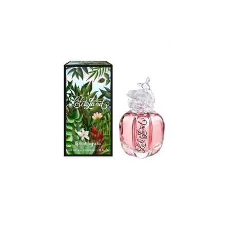 Le flacon rose de l'Eau de Parfum Lolita Lempicka Lolitaland 100ml avec un bouchon transparent sculpté se trouve à côté de sa boîte fleurie et ornée de feuilles. Dakar