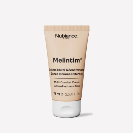 Un tube beige de Nubiance Melintim Crème Anti Tache Zones Sombres Multi Réconfortante Parties Intimes Externes 75 ml se tient debout sur un fond clair uni. Dakar