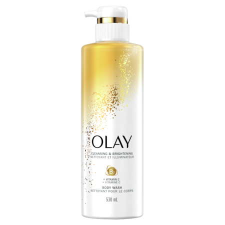 Un flacon blanc et or du nettoyant pour le corps nettoyant et éclaircissant avec vitamine C de Olay, doté d'un distributeur à pompe et d'un format de 530 ml, étiqueté en anglais et en français. Dakar