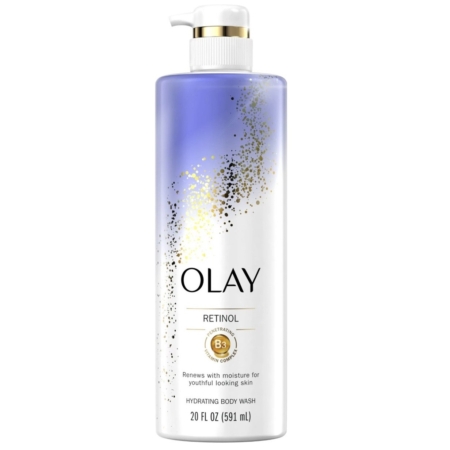 Une bouteille de gel douche hydratant au rétinol de Olay, 20 fl oz, avec un distributeur à pompe. L'étiquette est blanche et violette avec des accents dorés et un texte soulignant la teneur en rétinol et en vitamine B3. Dakar