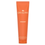 Tube orange de 150 ml de Origins Ginzing Nettoyant 2 en 1 Exfoliant Rafraîchissant avec texte blanc et or sur le devant. Dakar