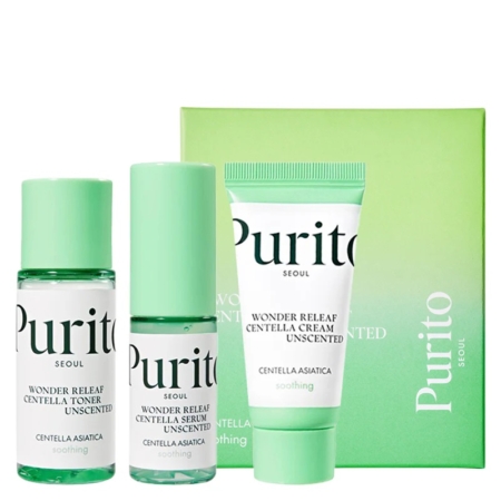 Le Trio Apaisant Rapide Wonder Releaf Kit Centella Mini sans Parfum, composé d'une lotion, d'un sérum et d'une crème, est présenté devant une boîte verte Purito, avec des étiquettes "Wonder Relief Centella" et des capuchons vert clair avec un emballage blanc-vert. Dakar