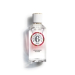 Flacon en verre transparent du parfum Roger & Gallet avec un bouchon blanc et or, comportant une étiquette ronde avec des accents colorés et le texte "GinGembre Rouge" sur le devant, sur un fond blanc. Dakar