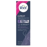 Boîte de crème dépilatoire Veet Expert pour le corps et les jambes, avec une bande diagonale rose, des détails sur le produit en allemand et un contour de jambes. La boîte met l'accent sur le beurre de karité et sur le fait qu'elle convient aux peaux sensibles. Format de 100 ml. Dakar