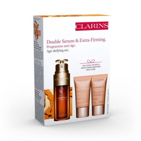 Une boîte du coffret Double Sérum et Extra-Régénérant anti-âge de Clarins, avec l'image d'un flacon de sérum et de deux tubes de soin sur la face avant, et les détails du produit en texte rouge et rose. Dakar