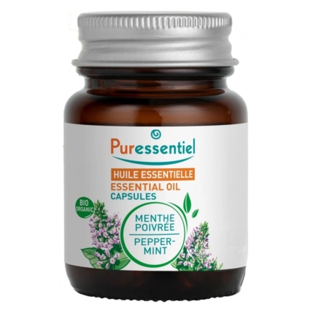 Un pot en verre marron étiqueté "Capsules d'huile essentielle Puressentiel" avec des illustrations de menthe poivrée et un texte vert indiquant "BIO ORGANIC" et "Peppermint" (menthe poivrée). Le pot est muni d'un bouchon à vis argenté. Dakar