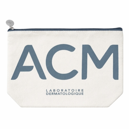 Une pochette à fermeture éclair de couleur crème avec "ACM" en grandes lettres bleues et "Laboratoire Dermatologique" en dessous, idéale pour ranger vos Ebelin Élastiques à Cheveux Noirs Lot de 4 pièces et d'autres articles essentiels. Dakar