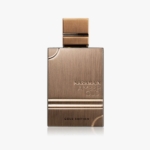 Flacon de parfum rectangulaire en or avec une finition métallique brossée, embossé avec les mots "HARAMAIN AMBER OUD" et "GOLD EDITION". Le bouchon est carré et assorti à la couleur or du flacon. Dakar