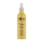 Un flacon pulvérisateur jaune de l'après-shampoing sans rinçage ApHogee Curlific ! Moisture Rich Leave-In conditioner, 8 fl oz (237 ml), avec un embout blanc et une étiquette violette. Dakar