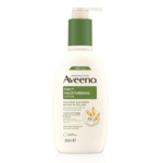 Un flacon de 300 ml d'Aveeno Daily Moisturising Lotion Crème Hydratante et Nourrissante avec un couvercle à pompe et une étiquette verte, soulignant ses avantages pour les peaux normales à sèches et l'avoine nourrissante en tant qu'ingrédient clé. Dakar