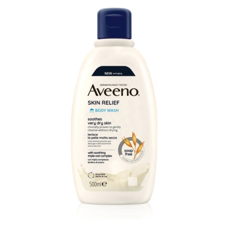 Un flacon de 500 ml d'Aveeno Skin Relief Body Wash avec un bouchon bleu, comportant un texte soulignant sa formule apaisante pour les peaux très sèches et ses ingrédients sans savon, ainsi que des images d'avoine et d'une éclaboussure de lait. Dakar