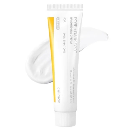 Un tube blanc étiqueté "Celimax Pore + Dark Spot Brightening Cream" pour un teint uniforme est représenté avec une trace de crème blanche à l'arrière-plan. Le tube a un accent jaune et un design épuré et minimaliste. Dakar