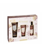 Un coffret étiqueté "Coffret Miel Gourmand" de MKL, comprenant trois produits de soin sur le thème du miel : un tube, un flacon pompe et un tube plus petit, avec un emballage festif doré et marron. Dakar