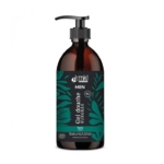 Un flacon pompe marron étiqueté "MKL Green Nature Men Gel Douche Surgras Tonic" avec des motifs de feuilles vertes et noires. Le flacon est conçu pour le visage, le corps et les cheveux et contient 96 % d'ingrédients naturels. Dakar