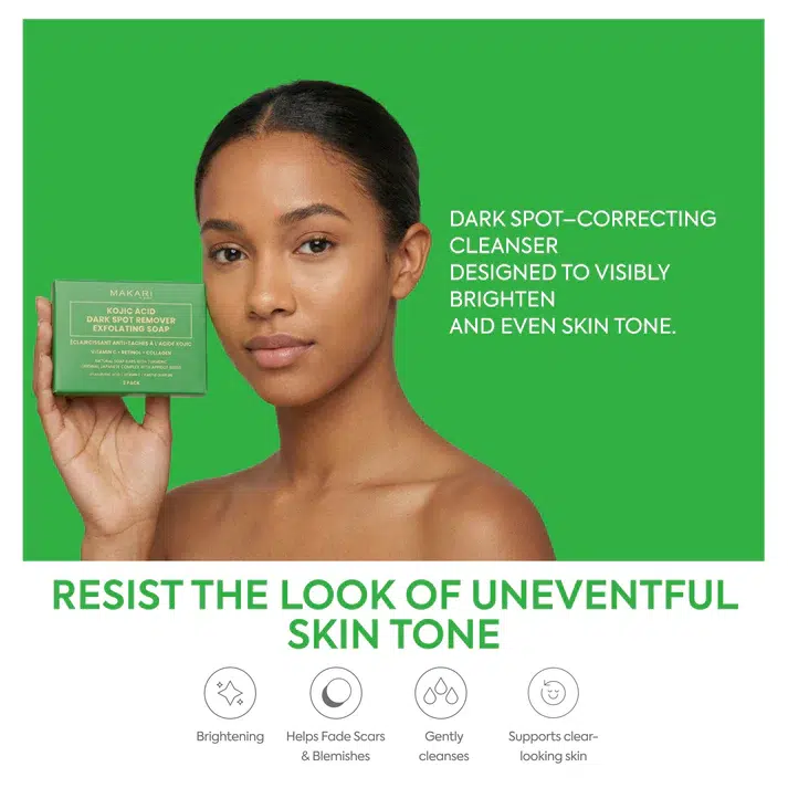 Une femme tient une boîte verte de savon exfoliant Makari. Le texte le décrit comme un nettoyant correcteur de taches sombres qui éclaircit et unifie le teint de la peau. Les icônes ci-dessous mettent en évidence ses propriétés éclaircissantes, nettoyantes et cicatrisantes. Dakar