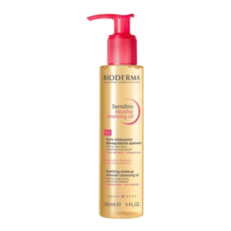 Un flacon de 150 ml d'huile micellaire démaquillante Bioderma Sensibio avec un distributeur à pompe rose ; le flacon comporte un texte jaune et rose indiquant qu'il s'agit d'un démaquillant apaisant pour les peaux sensibles. Dakar