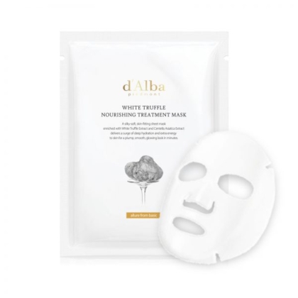 Un paquet de masque de traitement nourrissant à la truffe blanche du Piémont d'Alba est présenté, avec un masque en feuille blanc à côté. L'emballage est minimaliste, avec des accents dorés et l'image d'une truffe sur le devant. Dakar
