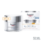 Un pot et une boîte de 50 ml de la crème de jour Eucerin Hyaluron-Filler 3x Effect avec SPF 30, étiquetée pour tous les types de peau. L'emballage est blanc avec des accents argentés et des reflets orange pour le SPF 30. Dakar