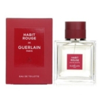 Un flacon de Guerlain Habit Rouge Eau de Toilette est présenté à côté de son emballage rouge et blanc, avec le nom de la marque et du parfum bien en évidence sur les deux éléments. Dakar
