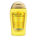 Un flacon jaune transparent d'Ogx Huile d'Argan du Maroc Huile Pénétrante Régénérante et Réparatrice pour Tous Types de Cheveux avec un bouchon doré, 100 ml (3.3 fl oz), idéal pour nourrir et réparer tous les types de cheveux. Dakar