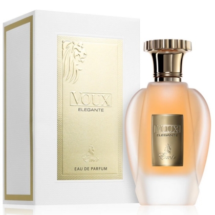 Un flacon de Voux Elegante Eau de Parfum avec un bouchon doré est présenté à côté de son coffret blanc et or assorti, tous deux ornés d'élégants détails dorés et d'un motif de lion. Dakar
