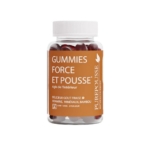 Une bouteille de PurePousse Gummies Force et Pousse avec une étiquette marron, contenant des suppléments gommeux rouges. L'étiquette mentionne un arôme de fraise, des vitamines, des minéraux, du bambou, et une posologie de 2 par jour pendant 1 mois. Dakar