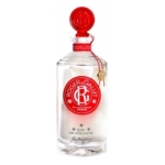 Un flacon en verre transparent de 500ml de Roger Et Gallet Jean Marie Farina Eau de Cologne avec un sceau de cire rouge, une breloque dorée, un capuchon décoratif, une étiquette rouge et blanche, et "Paris" imprimé sur le dessus. Dakar