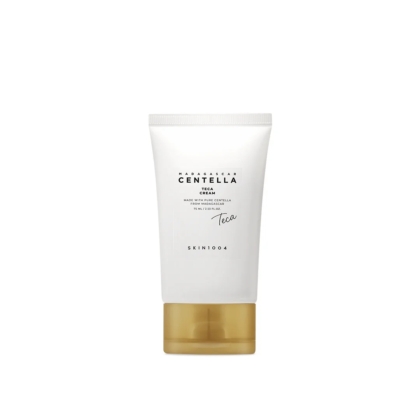 Un tube blanc avec un bouchon doré étiqueté "Skin1004 Teca Crème Gel Scellante et Apaisante à Base de Centella Asiatica 75ml", un produit de soin minimal, sur un fond blanc uni. Dakar