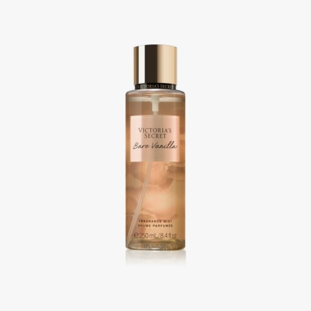 Une bouteille transparente de brume de parfum Victoria's Secret Bare Vanilla avec un bouchon doré et une étiquette pêche, contenant 250 ml (8,4 oz liq.) de produit, présentée sur un fond blanc. Dakar