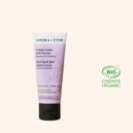 Aroma Zone Crème Mains Anti Taches Vitamine C et Glabridine 50 ml est représenté sur fond clair, avec le logo vert COSMOS ORGANIC certifié biologique visible. Dakar
