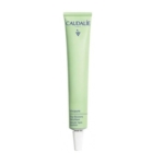 Un tube vert clair de Caudalie Vinopure Stop Boutons Salicylique 15ml avec un bouchon à vis blanc est présenté à la verticale sur un fond blanc. Dakar