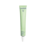 Un tube vert de 15 ml de Caudalie Vinopure Stop Boutons Salicylique avec un bouchon blanc est présenté à la verticale sur un fond blanc uni. Dakar