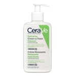 Un flacon pompe blanc de CeraVe Hydrating Cream-to-Foam Cleanser pour peaux normales à sèches, format 8 fl oz, avec un étiquetage vert et blanc et des détails sur le produit en anglais et en français. Dakar