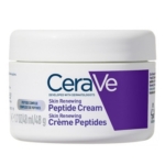 Un pot blanc de CeraVe Skin Renewing Peptide Cream avec une étiquette violette, affichant un texte en anglais et en français. Le pot contient 48 g (1,7 oz) de produit et mentionne les peptides et le développement dermatologique. Dakar