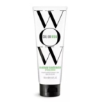 Un tube de crème coiffante Color Wow One Minute Transformation, 120 ml, avec un lettrage noir "WOW" et des détails sur le produit sur un fond blanc. Dakar